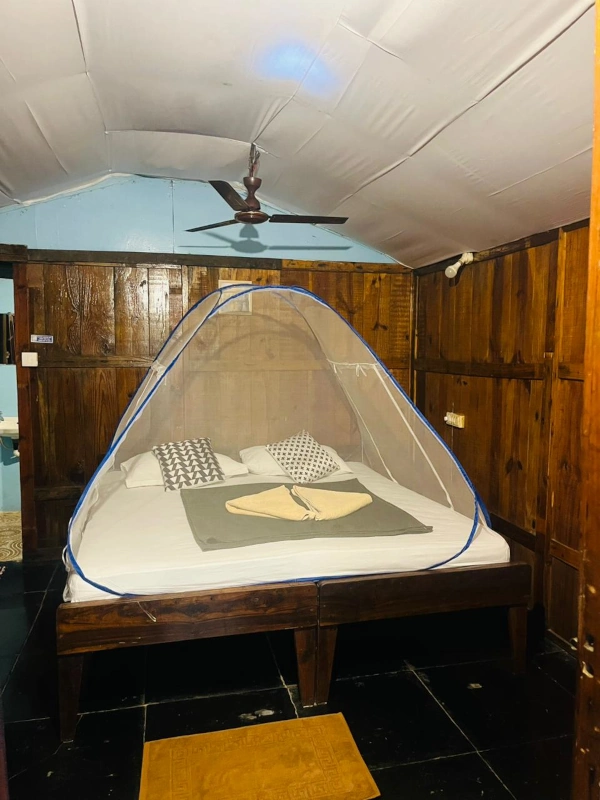 Garden View Non-Ac Hut Bedroom